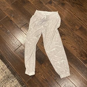 Woman’s silver crushed velvet joggers from Victorias Secret.  Never worn.  Small